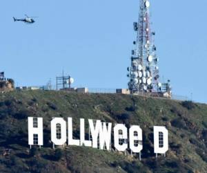 El cartel de Hollywood se conviertió en Hollyweed... en honor a la marihuana. Fotos AFP