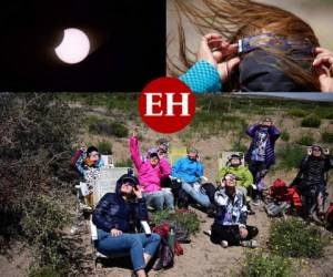 Se hizo la noche al mediodía y se abrió un claro el cielo encapotado este lunes en el sur de Chile permitiendo a miles de personas disfrutar del eclipse de Sol, que para los indígenas mapuches puede ser el inicio a un nuevo ciclo o un mal augurio. Estas son las imágenes del espectáculo... Fotos AFP| AP