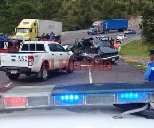 El cuerpo del teniente quedó dentro del vehículo. Foto: Stalín Irías/EL HERALDO