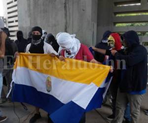 Integrantes del MEU durante la lectura de un comunicado en el que rechazan algunas disposiciones del dictamen aprobado el jueves en el Congreso Nacional. Fotos: Mario Urrutia/ EL HERALDO