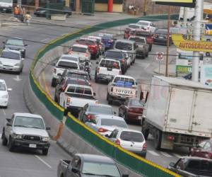 Más de medio millón de vehículos, entre carros y motocicletas, circulan en la capital hondureña y una cifra similar en San Pedro Sula.