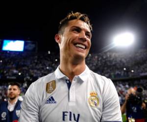 Cristiano Ronaldo, delantero del Real Madrid, durante la celebración de la conquista de La Liga (Foto: AP)