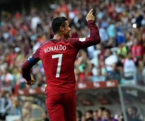 Cristiano Ronaldo, delantero de Portugal, anotó tres goles. (AFP)