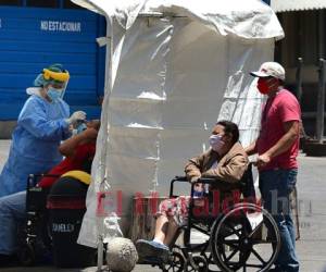 291 personas han fallecido por covid-19 en Honduras hasta la fecha. Además hay en este momento 684 hospitalizados. Foto: AFP.