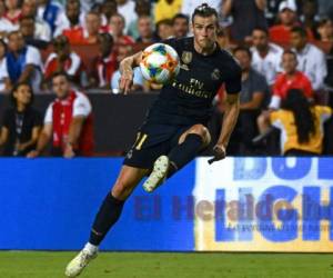 Bale se encontraba en China para firmar su contrato, pero tuvo que regresar a España. (AFP)