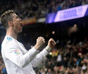 Cristiano Ronaldo celebrando uno de sus cuatro goles anotados al Girona FC. (AFP)