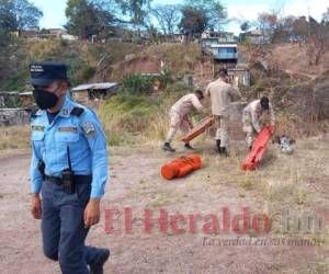 El cuerpo de Erik Rodríguez fue hallado dentro del pozo. Fotos: Estalin Irías | EL HERALDO.