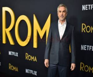 El director mexicano Alfonso Cuarón llega para el estreno de 'Roma' en Los Ángeles en el teatro egipcio de Hollywood. Agencia AFP.
