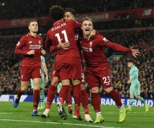 Celebración de uno de los goles del Liverpool ante el Arsenal en la Premier League. Foto:AFP