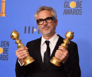 Alfonso Cuarón fue el gran ganador en los Globos de Oro 2019. (AFP)