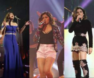 La hondureña Katheryn Banegas brilla en el reality show La Academia. Cada domingo sorprende al público con su calidad vocal y belleza en el escenario. Aquí un recuento de los atuendos que ha usado durante los conciertos. Fotos cortesía Facebook @academiaazteca