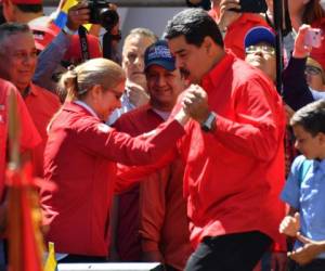 Así bailó salsa Nicolás Maduro con su esposa Cilia frente a todo el público. Foto AFP