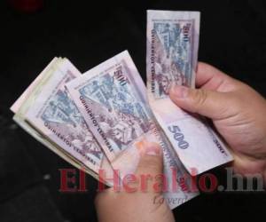 Solo alrededor del 20% de los asalariados en Honduras ganan más de dos salarios mínimos, según los reportes oficiales de la Secretaría de Trabajo. Foto: El Heraldo