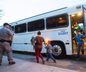 Migrant children who have been separated from their families can be seen in tents at a detention center in Homestead, Florida on June 27, 2019. - Public outcry over Trump's handling of the border crisis has increased dramatically after a migrant rights group revealed alarming detention conditions of migrant children in Texas, where children were deprived of showers and clean clothes for weeks. (Photo by RHONA WISE / AFP)