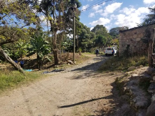 Los cuerpos quedaron en la calle del barrio las Delicias de Corquín, Copán.