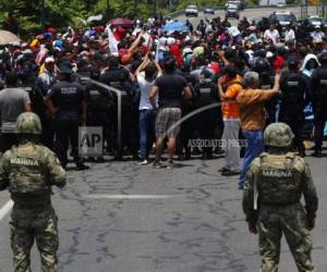 Trump amenazó con imponer aranceles progresivos a México hasta llegar a 25% si no frenaba el paso de migrantes indocumentados, mayormente centroamericanos. Foto: AFP.