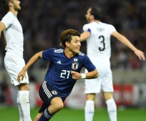 Celebración de uno de los goles de la selección de Japón contra los uruguayos. Foto:AFP