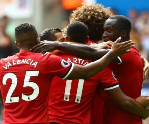 Manchester United goleó al Swansea y se ubica en el top de la Premier. (AFP)