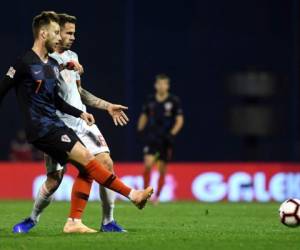 Después de este resultado, la Roja queda a expensas de lo que hagan balcánicos e ingleses el domingo en Wembley. Foto:AFP