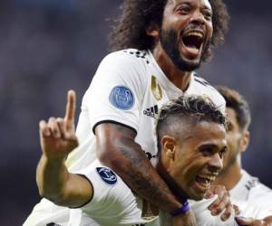 Marcelo y Mariano Díaz en una celebración del Real Madrid en la liga local. Foto:AFP