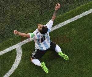 Messi celebrando el primer gol argentino ante Nigeria. Se sacó la mala suerte con él. Foto: Agencia AFP.