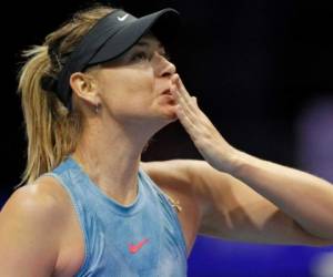 La tenista rusa María Sharapova ha ganado los cuatro abiertos de Grand Slam. (AFP)