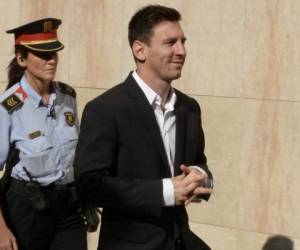 'Nunca miré el tema del dinero. Es algo que maneja mi papá. Y confío en él. Yo me dedico a jugar a fútbol', respondió Messi. Foto: AFP