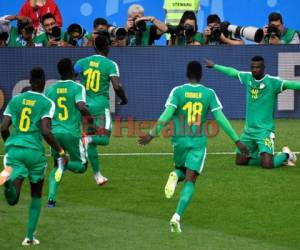 Niang de Senegal anota el 2-0 ante Polonia tras un error del portero Szczęsny. Foto:AFP