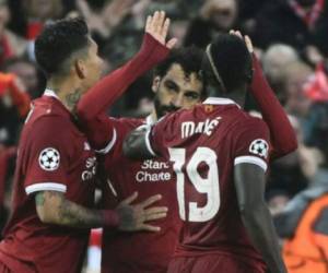 El tridente del Liverpool se convirtió en la delantera más goleadora en la historia de la Champions. (Foto: AFP)