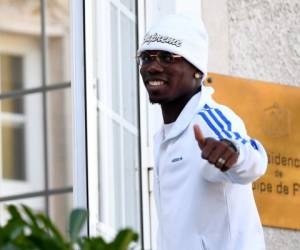 French midfielder Paul Pogba arrives at France's national football team training base in Clairefontaine en Yvelines on October 8, 2018, for the team's preparation ahead of the upcoming friendly match against Iceland and the Nations League match against Germany. (Photo by FRANCK FIFE / AFP)