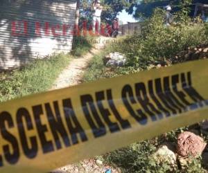 El primer cuerpo fue encontrado en el sector 2 decolonia Villa Nueva. Foto: Estalin Irías | EL HERALDO