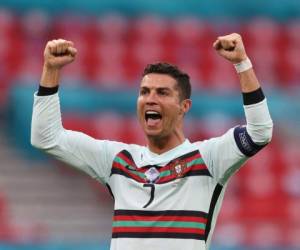 El delantero portugués Cristiano Ronaldo celebra al final del partido de fútbol del Grupo F de la UEFA EURO 2020 entre Hungría y Portugal en el Puskas Arena de Budapest. Foto:AFP