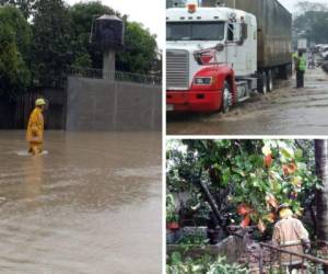 Así lucen algunas carreteras en San Pedro Sula, norte de Honduras, a raíz de las fuertes lluvias.