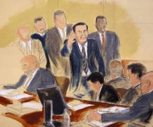 Joaquín 'El Chapo' Guzmán, rodeado de alguaciles de Estados Unidos en la sala del tribunal de la Corte Federal de Brooklyn, mientras su juicio de alta seguridad comenzó en el distrito de Brooklyn, Nueva York. Foto AP