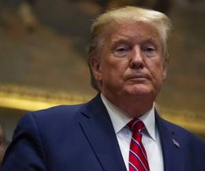 US President Donald Trump looks on after delivering an update on 'Operation Warp Speed' in the Rose Garden of the White House in Washington, DC on November 13, 2020. (Photo by MANDEL NGAN / AFP)