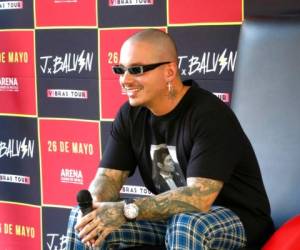 J Balvin smiles during a press conference in Mexico City, Friday, March 9, 2018. J Balvin will bring his Vibras Tour to Mexico City on May 26. (AP Photo/Berenice Bautista)