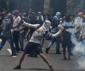 El gobierno acusa a la oposición de 'terrorismo' y ésta a las fuerzas de seguridad de represión y torturas. La ola de protestas deja cinco muertos, decenas de heridos y más de 200 detenidos. Fotos AFP
