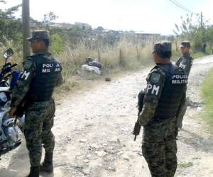 Elementos de la Policía Militar resguardaban la escena del crimen. (Fotos: Wilfredo Alvarado)
