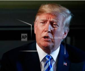 El presidente Donald Trump habla durante una reunión con los líderes estatales sobre la reforma de la prisión, el jueves, 9 de agosto de 2018, en el Trump National Golf Club en Bedminster, N.J.