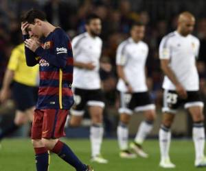 Aunque Messi marcó el gol 500 de su carrera, el conjunto azulgrana no pudo empatar el partido ante el Valencia, fotos: AFP.