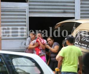 Los cadáveres de Allan Herrera Mejía y Jairo Mejía Juárez fueron trasladados hasta su natal Olancho. Foto: Estalin Irías/ EL HERALDO