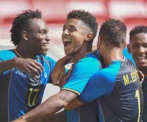 Los jugadores de Honduras celebran el gol de Lozano que dió la clasificación a cuartos de final (Foto: AFP)