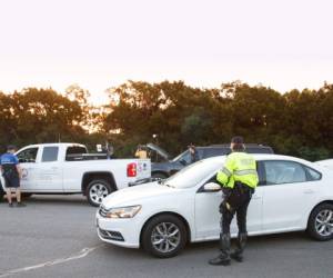 'La comunidad afectada está ahora bajo virtual arresto domiciliario y se supone que toda la ciudad está en estado de temor, lo que puede convertirse fácilmente en pánico', apuntaron las autoridades. (Foto: AFP/ El Heraldo Honduras)