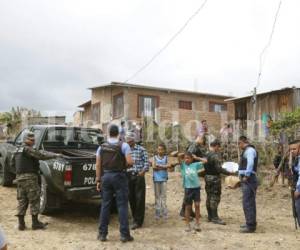 Presencia militar en los alrededores de la colonia Altos de La Laguna donde se rescató a una menor que permanecía secuestrada. Fotos: Estalin Irías/ EL HERALDO