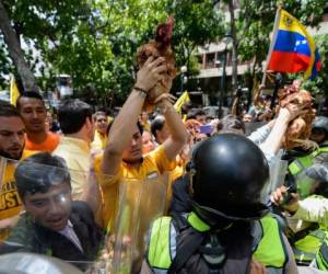 Venezuela que está sumida en protestas evalúa presentar una denuncia ante la Asamblea General de la ONU (Foto: AFP/ El Heraldo Honduras/ Noticias de Honduras)