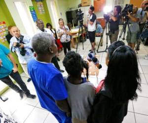 Un grupo de haitianos celebran la decisión de EEUU de ampliarles el TPS, beneficio que reciben desde que su país sufrió un devastador terremoto. (Foto: AP/El Heraldo Honduras/ Noticias de Honduras)