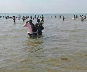 Los naufragos nadaron hasta una hora para poder llegar a la orilla del lago (Foto: AFP/ El Heraldo Honduras/ Noticias de Honduras)