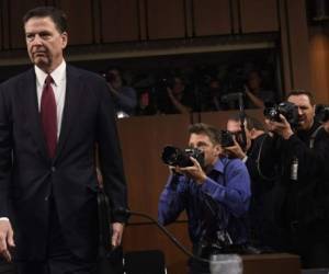 Former FBI Director James Comey arrives to testify during a US Senate Select Committee on Intelligence hearing on Capitol Hill in Washington, DC, June 8, 2017. / AFP PHOTO / Jose ROMERO AND SAUL LOEB / ALTERNATIVE CROP