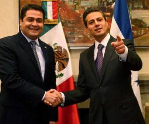 Juan Orlando Hernández, presidente de Honduras, en un encuentro con su par de México, Enrique Peña Nieto.