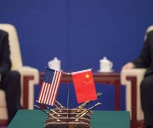 El presidente de los Estados Unidos, Donald Trump y el presidente de China, Xi Jinping, asisten a una reunión de líderes empresariales AFP/GETTY